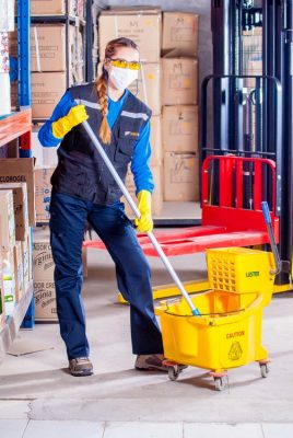 woman cleaning mopping floors